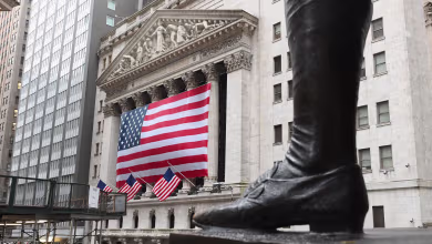 Dow drops over 400 points on what would have been tax day