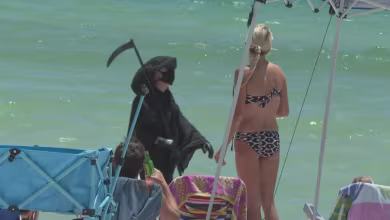 Man dresses as Grim Reaper to warn Florida beachgoers about coronavirus