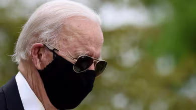 Watch: Biden wears black face mask in first public appearance since March