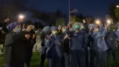 Hospital staff hold candlelight vigil for patients, coworkers lost to COVID-19