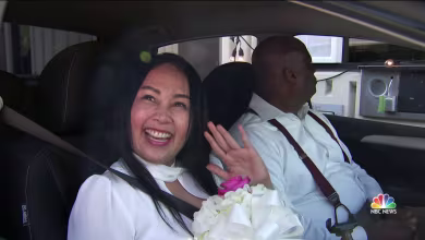 Happy couples celebrate love with drive-thru weddings