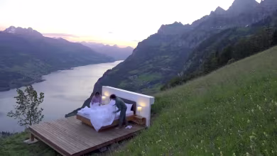 Artists represent coronavirus concepts with hotel room on Swiss mountainside