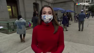 'I'm committed': Early voters motivated as they wait in line in Philadelphia