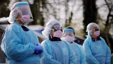 Strained health care workers plead for Americans to wear masks