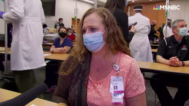 Ohio nurse receiving Covid vaccine says she is 'happy to be part of the solution'