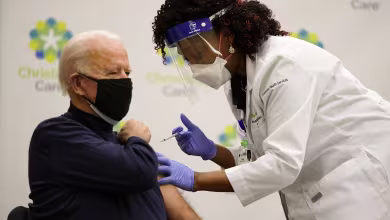 Watch: Biden receives coronavirus vaccine