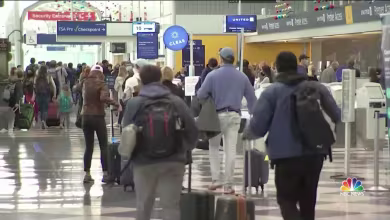 Holiday rush begins despite travel warnings