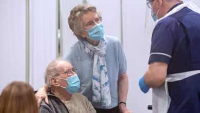 Elderly British newlyweds describe joy of being vaccinated