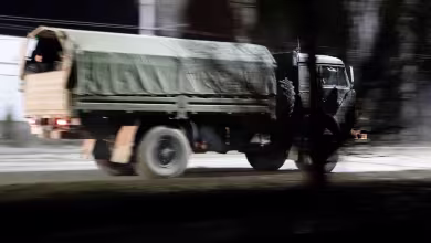 Military convoys appear in Donetsk hours after Putin orders