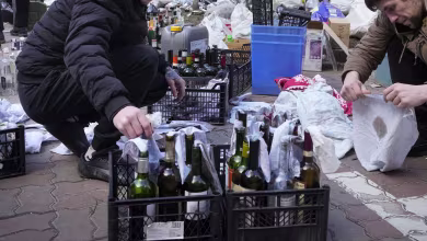 Watch: Kyiv civil defense prepares Molotov cocktails