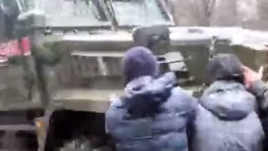 Watch: Civilians resist military convoy in Melitopol, Ukraine