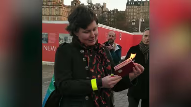 ‘I no longer want to be a citizen’: Russian woman burns passport in support of Ukraine
