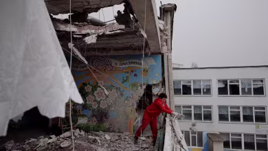 Parents, teachers clear rubble from Kharkiv school hit by Russian missile
