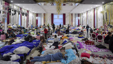 Romanian hotel turns ballroom into refugee shelter as millions flee Ukraine