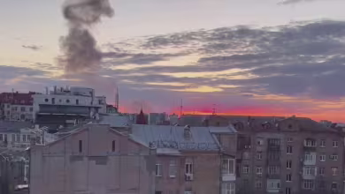 Smoke billows from Kyiv after two missiles strike city's center