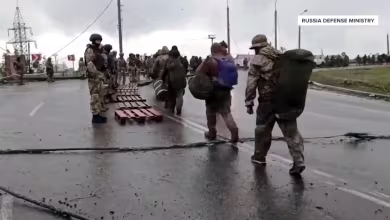Russia parades surrendering Ukrainian fighters through Mariupol