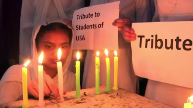 Indian students hold candlelit vigil for Texas school shooting victims