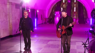 'We say thank you': U2 rockers Bono and The Edge stand with Ukraine in surprise performance