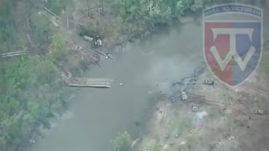 Ukrainian forces release video of destroyed bridge, military vehicles at river crossing
