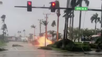 Video shows burning power line, falling traffic light after Ian