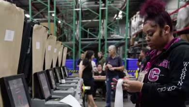 Scenes from Election Day: Polling places without paper, long lines, last-minute campaign stops