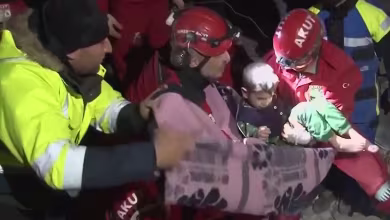 Video shows mom and young son saved from collapsed apartment