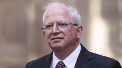 Former Trump lawyer John Eastman surrenders in Georgia election indictment