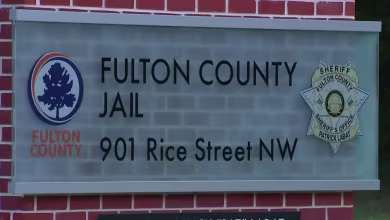 Trump co-defendants surrender for processing in Georgia