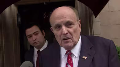 Rudy Giuliani surrenders at Georgia jail, says previous false statements don’t admit guilt