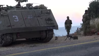 Israeli troops and tanks deployed on the Lebanese border