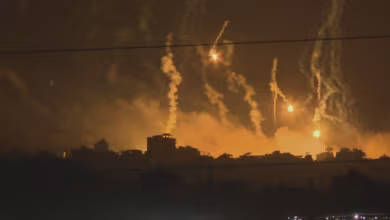 Gaza skyline shows series of flares being fired, explosions heard in distance