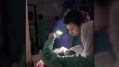 WATCH: Gaza hospital staff use cellphone flashlight to do a medical procedure