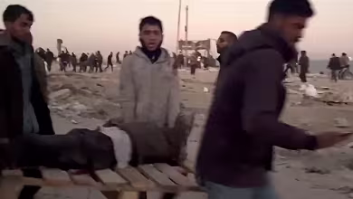 Israeli troops open fire on Palestinians waiting for aid in Gaza, health ministry says