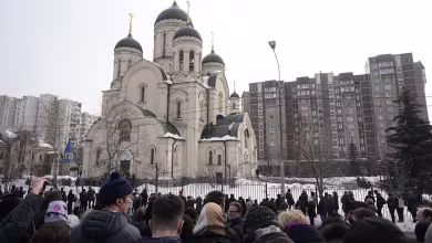 Thousands gather as Alexei Navalny is laid to rest in Moscow