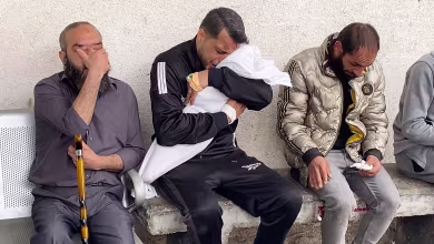 Gazan father bids tearful farewell to dead wife and daughters