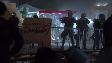 Protesters detained as police start to clear the UCLA encampment