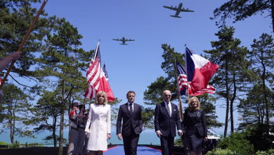 Biden stands with WWII veterans to mark D-Day 80th anniversary