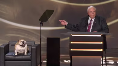 West Virginia Gov. Jim Justice brings Babydog on stage for his RNC speech