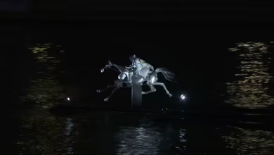 Watch: Metal horse gallops down Seine River at Olympics opening ceremony