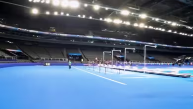 Elizabeth Beisel walks through Team USA's ready room at Paris Olympics