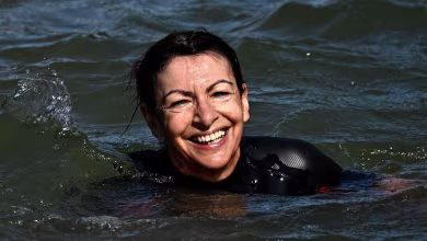 Mayor of Paris follows through on promise to swim in Seine