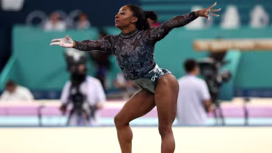 Simone Biles shows grit in Paris Olympic qualification