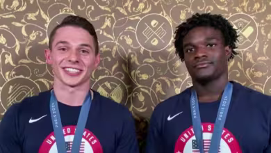 Team USA gymnasts Frederick Richard and Paul Juda celebrate their historic bronze win