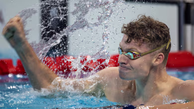 Marchand seeing double, captures two golds in historic day