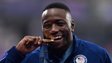 Grant Holloway gets gold in 110-meter hurdles medal ceremony