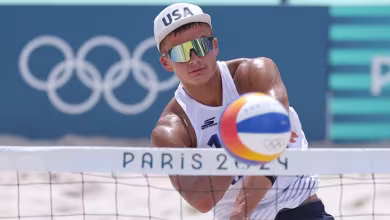 USA outlasts Brazil to reach beach volleyball Round of 16