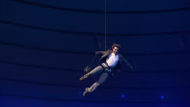 Tom Cruise rappels from Stade de France roof