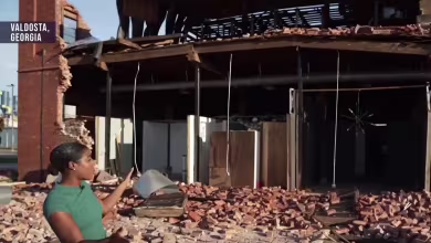 Strong winds knocked out power lines, downed trees and buildings in Georgia