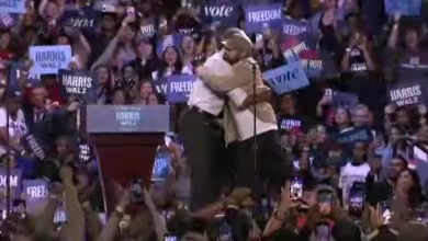 Obama jokes his 'palms are sweaty' after Eminem introduces him at Detroit rally