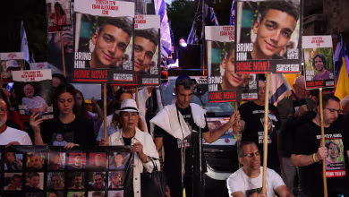 Supporters of Gaza hostages march to Netanyahu's residence on Hamas attack anniversary